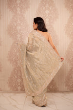 Noor (Green Crushed Tissue Embroidery Saree)